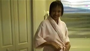 Horny Asian Granny Fucks her Cunt in the Hot Tube